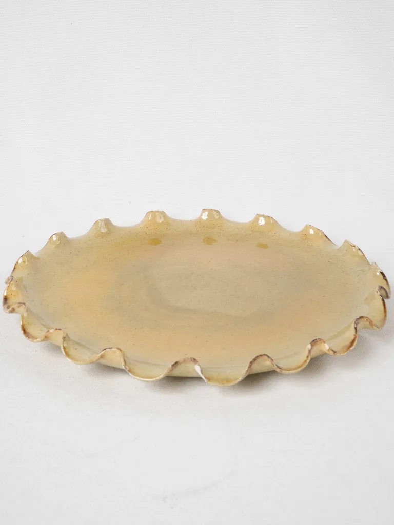 Platter w/ pretty rippled edge & yellow ochre glaze 12½"